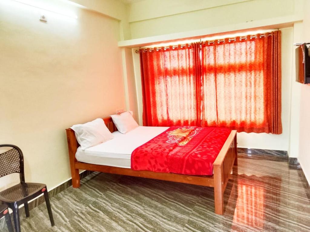 Postel nebo postele na pokoji v ubytování Elegant Homestay