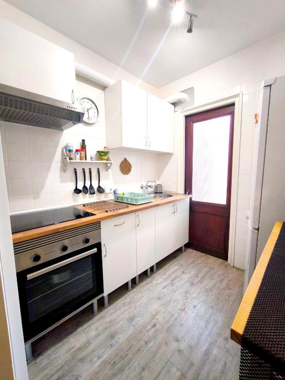 A kitchen or kitchenette at Apartamento Rivera#2
