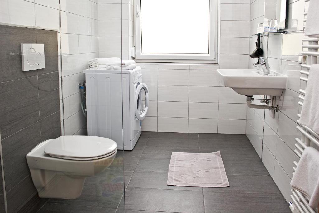 Koupelna v ubytování Aparthotel Klopeinersee