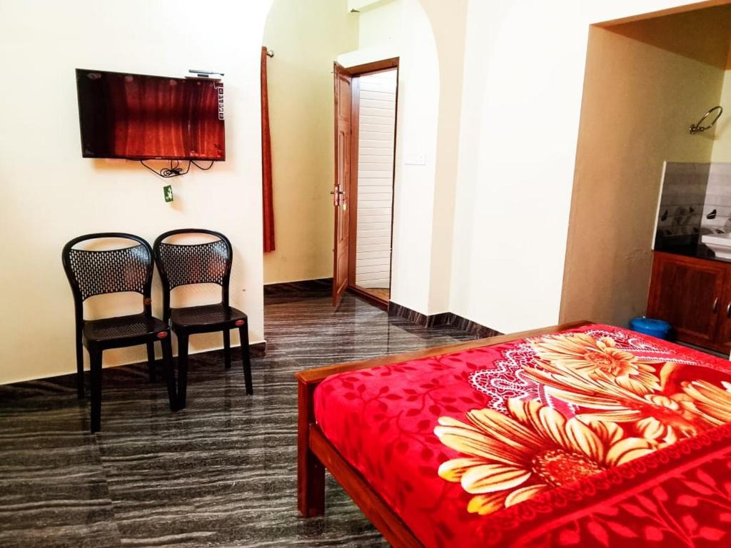 Postel nebo postele na pokoji v ubytování Elegant Homestay