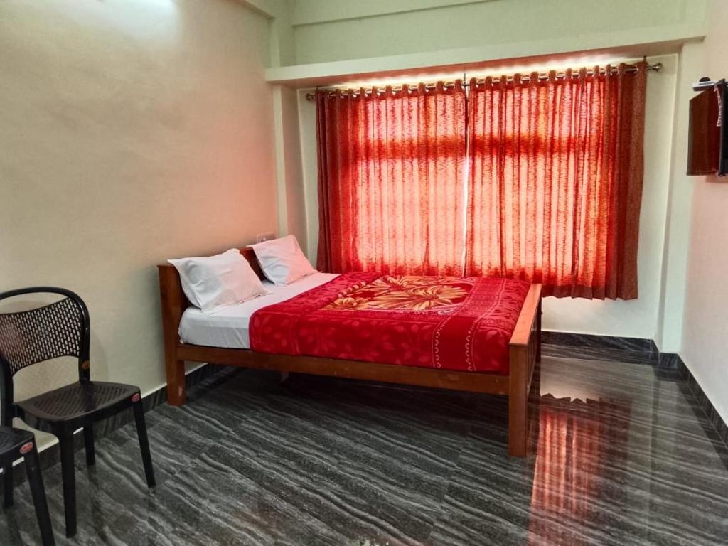 Postel nebo postele na pokoji v ubytování Elegant Homestay