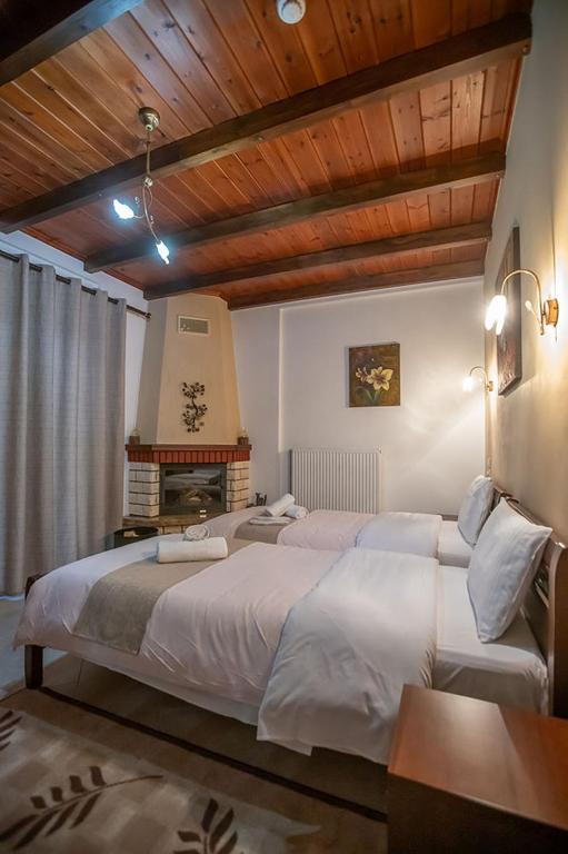 Łóżko lub łóżka w pokoju w obiekcie Guesthouse Moucha