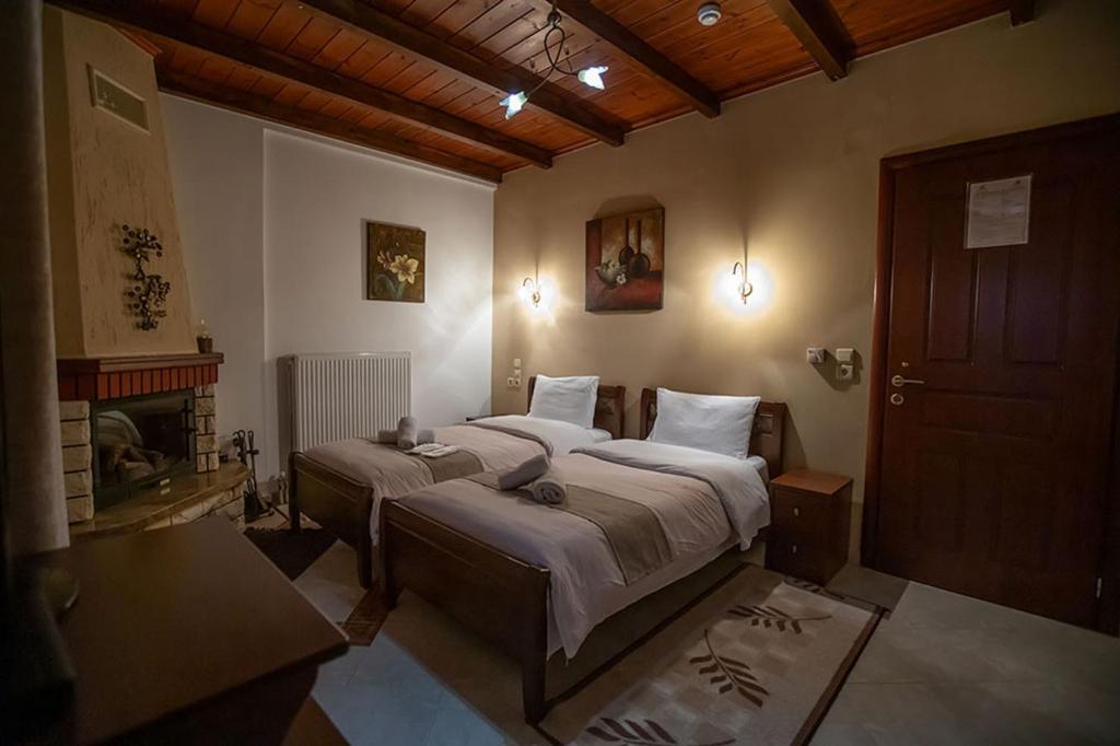 Łóżko lub łóżka w pokoju w obiekcie Guesthouse Moucha