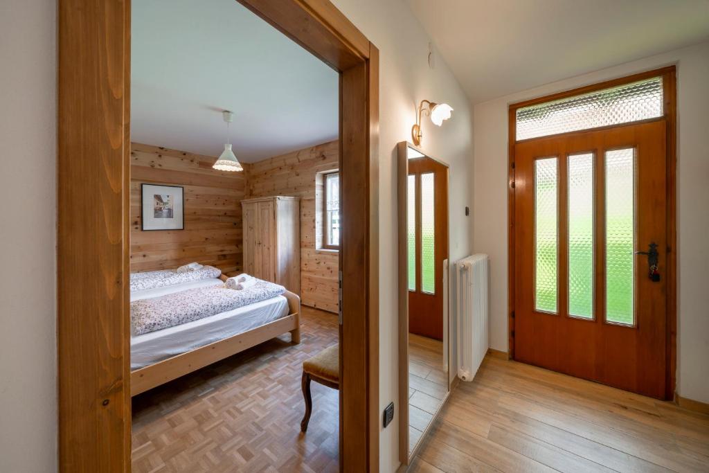 Łóżko lub łóżka w pokoju w obiekcie Casa del Salice