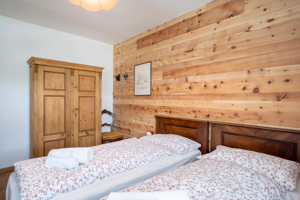 Łóżko lub łóżka w pokoju w obiekcie Casa del Salice