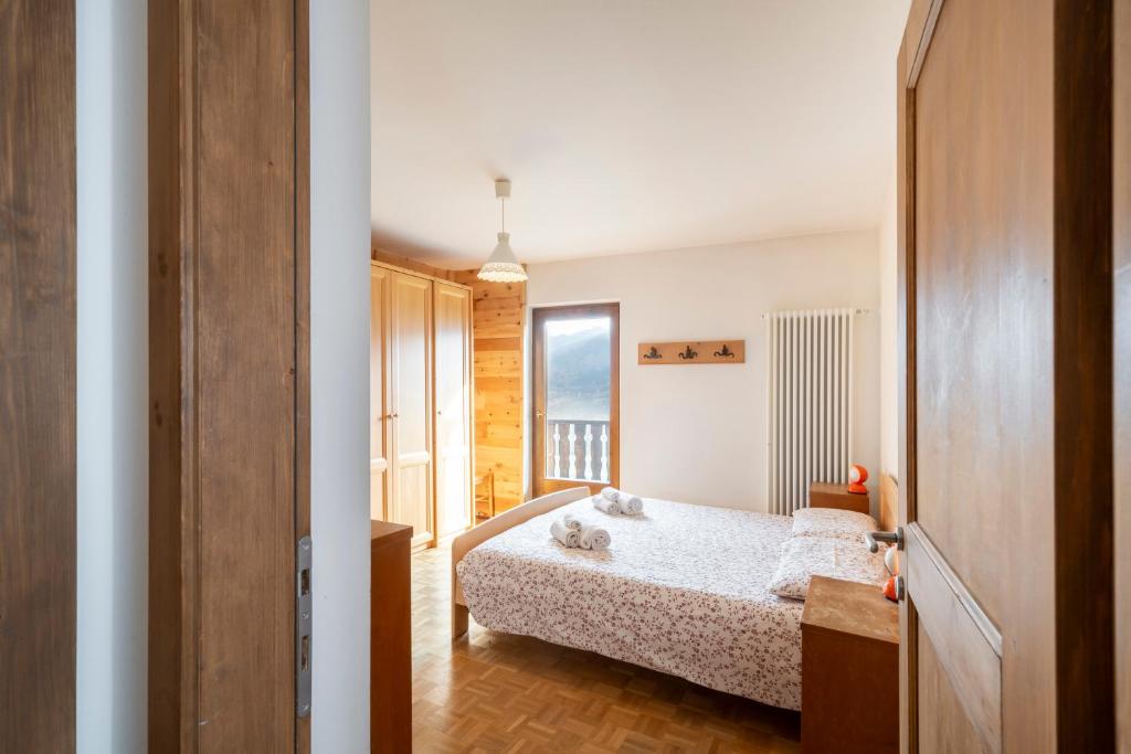 Łóżko lub łóżka w pokoju w obiekcie Casa del Salice