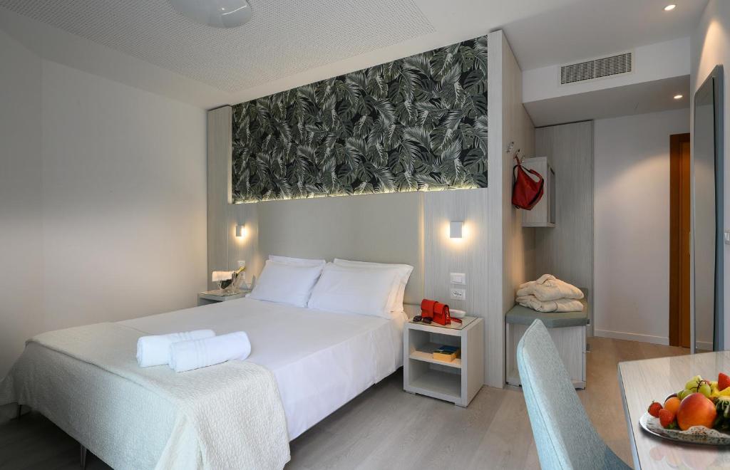 Postel nebo postele na pokoji v ubytování Grand Hotel Playa