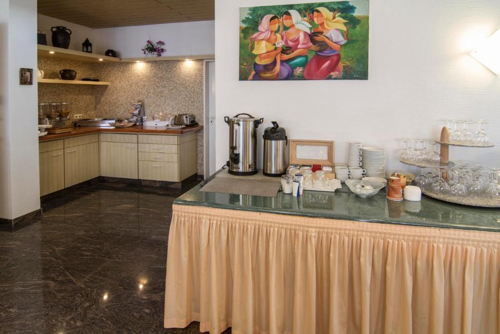 Kuchyň nebo kuchyňský kout v ubytování Hotel Maurer
