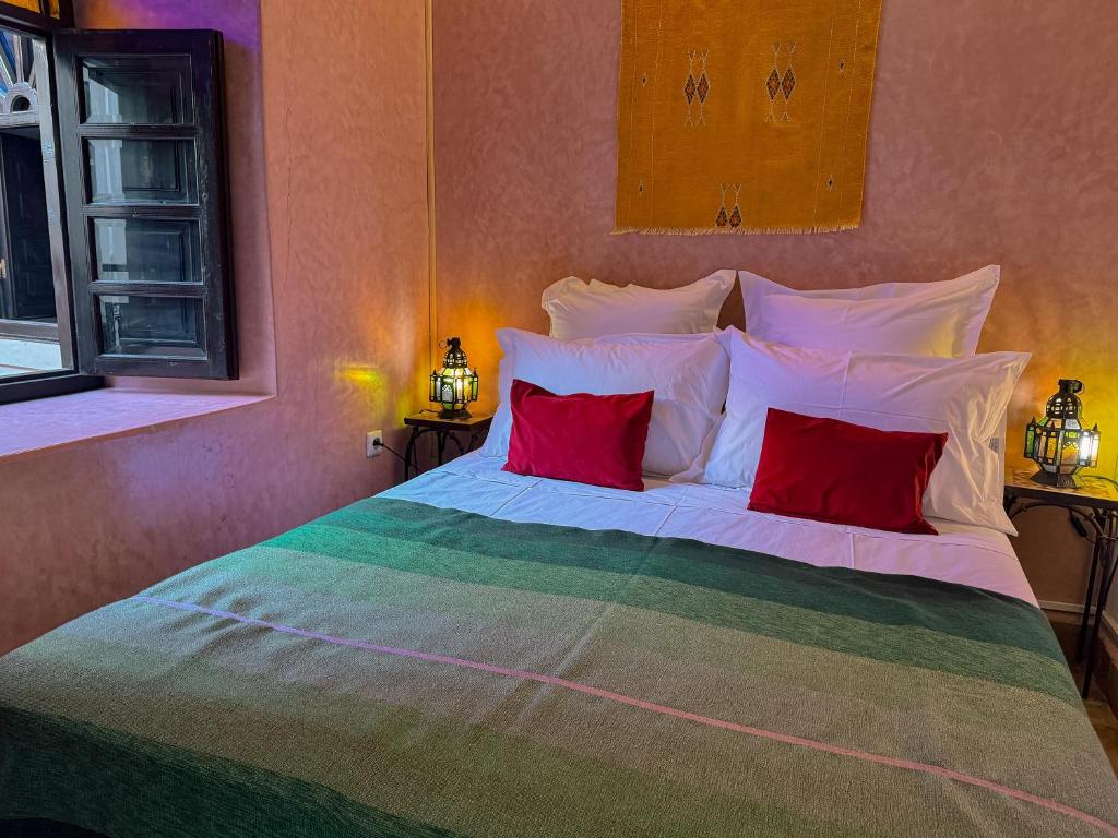 Postel nebo postele na pokoji v ubytování Riad Lapis-lazuli