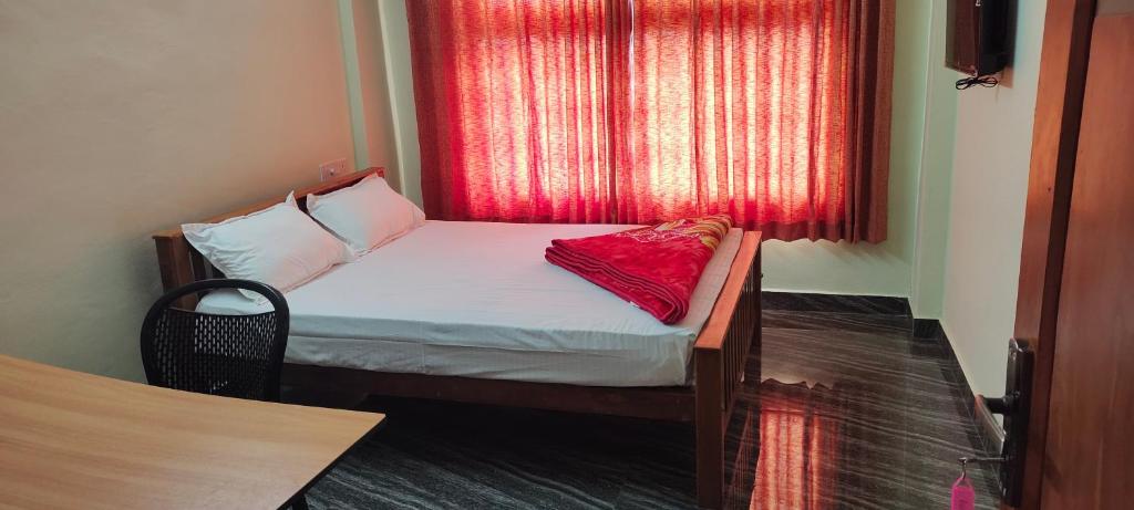 Postel nebo postele na pokoji v ubytování Elegant Homestay