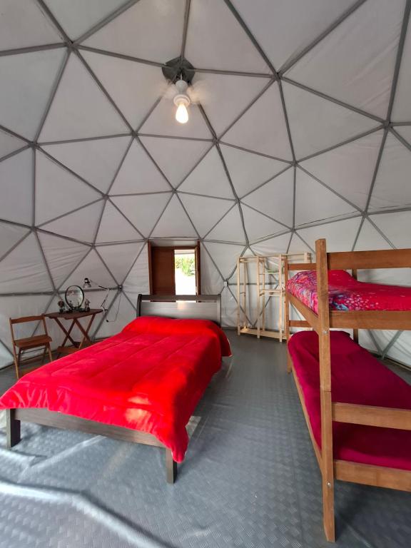 Voodi või voodid majutusasutuse Glamping Sitio das Tartarugas toas