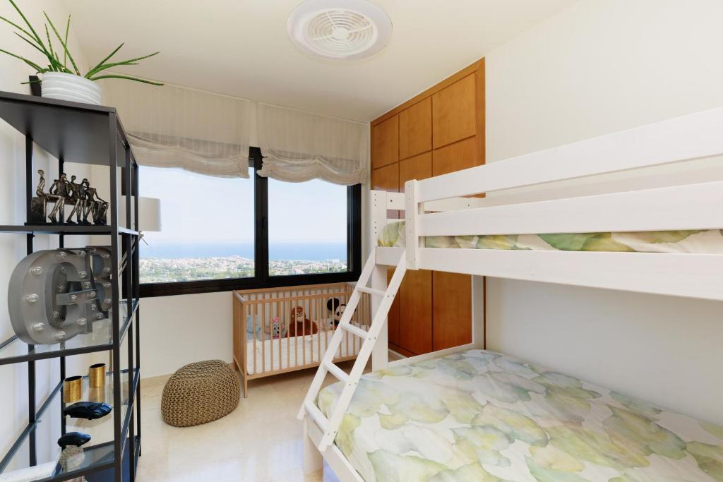 A bed or beds in a room at Villa Infinity Barcelona