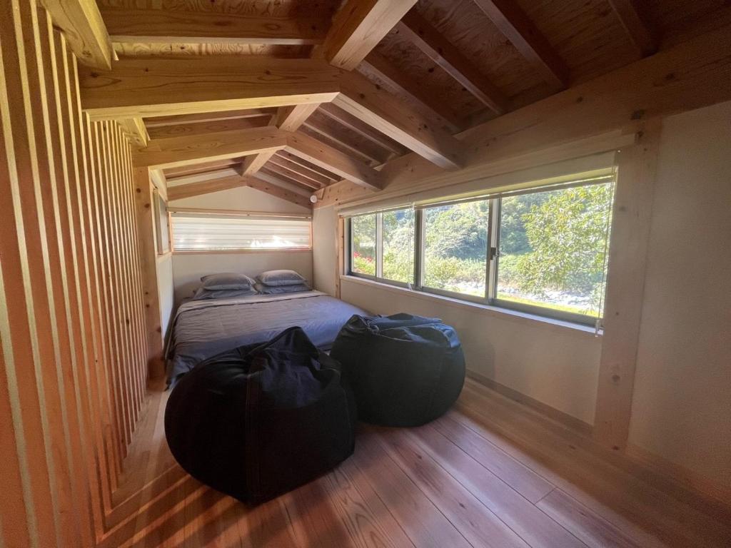 Ένα ή περισσότερα κρεβάτια σε δωμάτιο στο Tiny House - Vacation STAY 12059v
