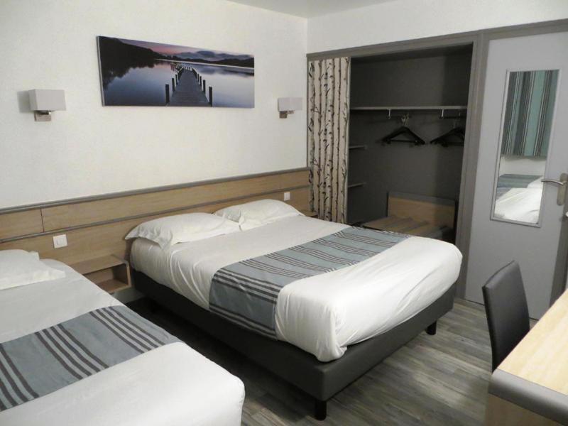 Postel nebo postele na pokoji v ubytování Brit Hotel Dijon Hermes