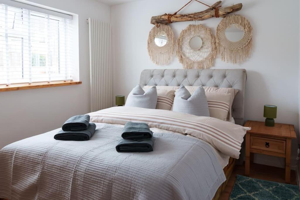 Ένα ή περισσότερα κρεβάτια σε δωμάτιο στο Bona - Principality Stadium - City Centre -Cardiff