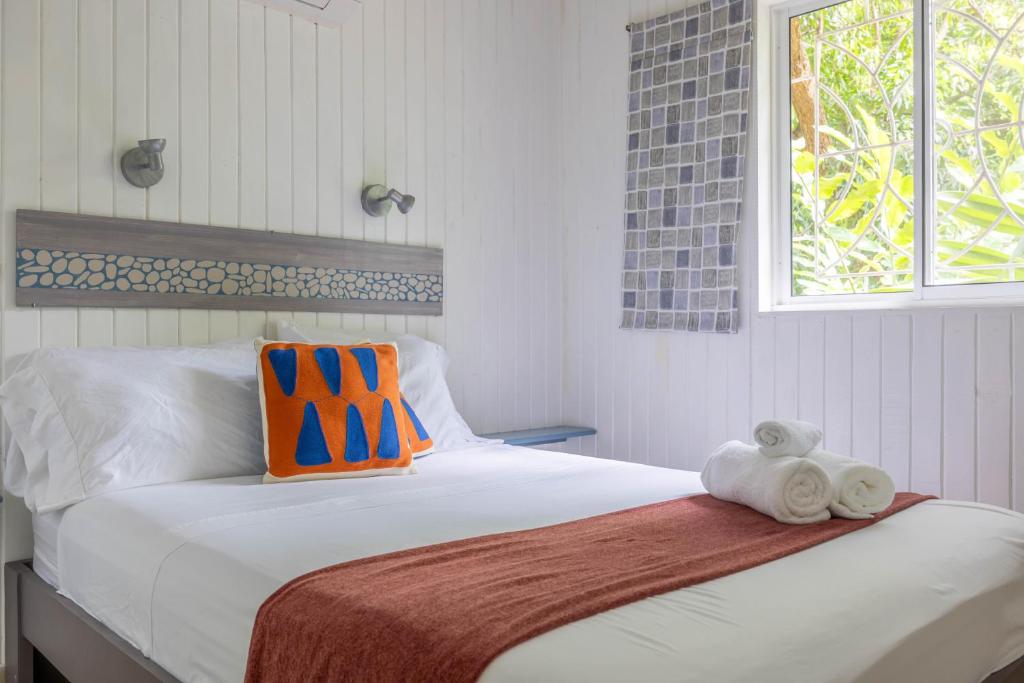 Postel nebo postele na pokoji v ubytování Boho lodge Montezuma l&l