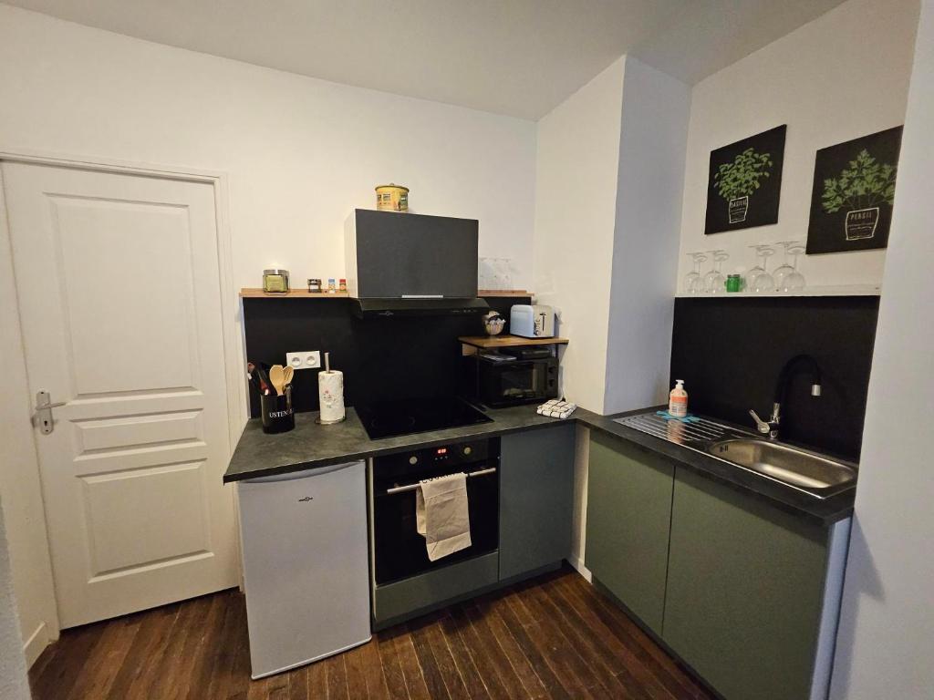Kuchyň nebo kuchyňský kout v ubytování T2 cosy