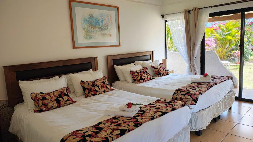 Postel nebo postele na pokoji v ubytování Hotel Gomero