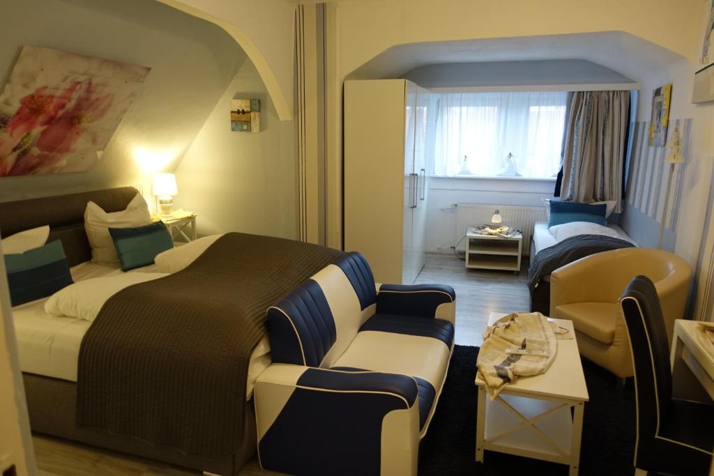 Postel nebo postele na pokoji v ubytování Hotel Villa Konstanz