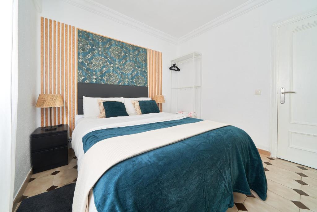 Posteľ alebo postele v izbe v ubytovaní Fantástico apartamento junto a la estación