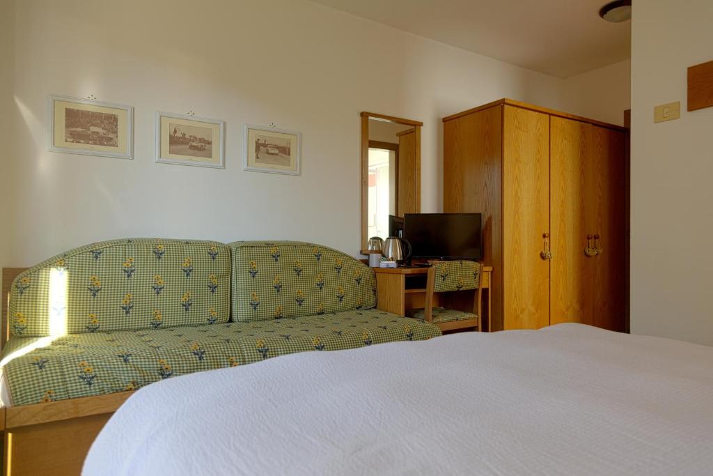 Postel nebo postele na pokoji v ubytování Chalet La Felce
