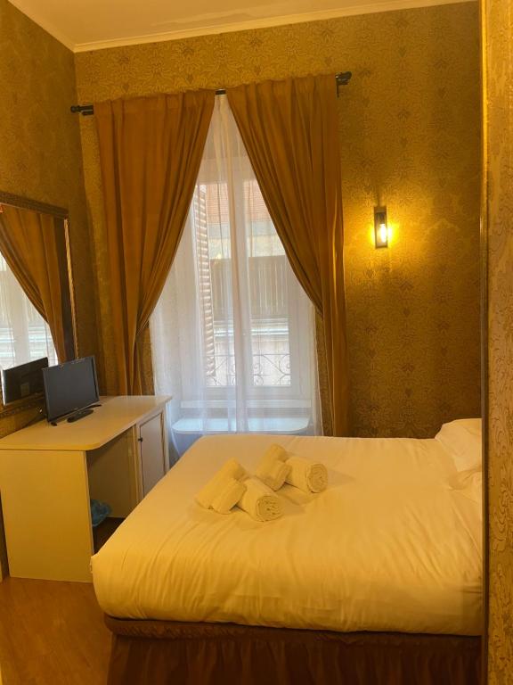 Postel nebo postele na pokoji v ubytování DCBoutiqueHotel
