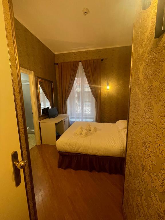 Postel nebo postele na pokoji v ubytování DCBoutiqueHotel