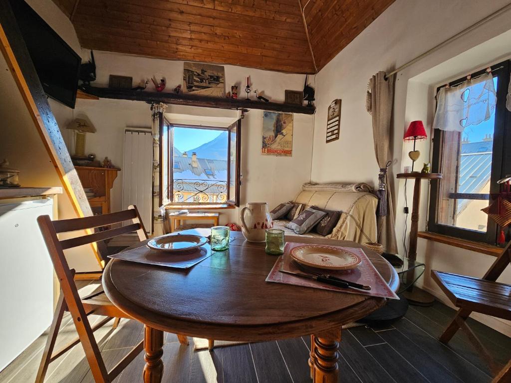 Posezení v ubytování Atypique Duplex