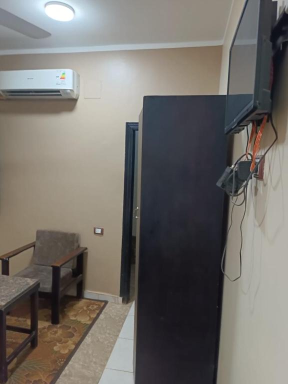 TV a/nebo společenská místnost v ubytování فندق الإيمان El Eman Hotel