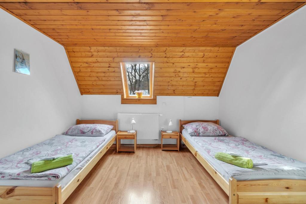Postelja oz. postelje v sobi nastanitve Ubytování nad Bisonem