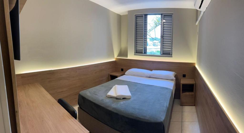 Postel nebo postele na pokoji v ubytování Ipê Hotel Curitiba - Aeroporto