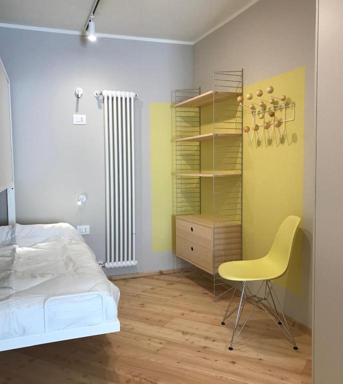 Postel nebo postele na pokoji v ubytování Palazzo Righi