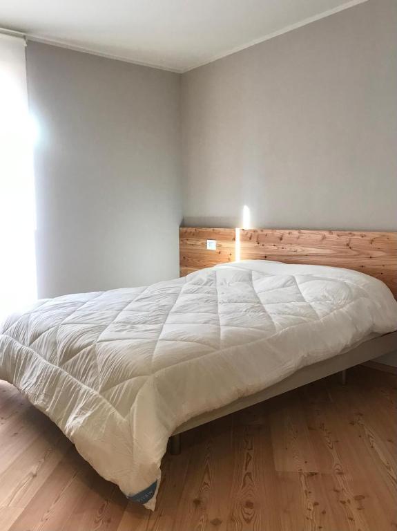Postel nebo postele na pokoji v ubytování Palazzo Righi