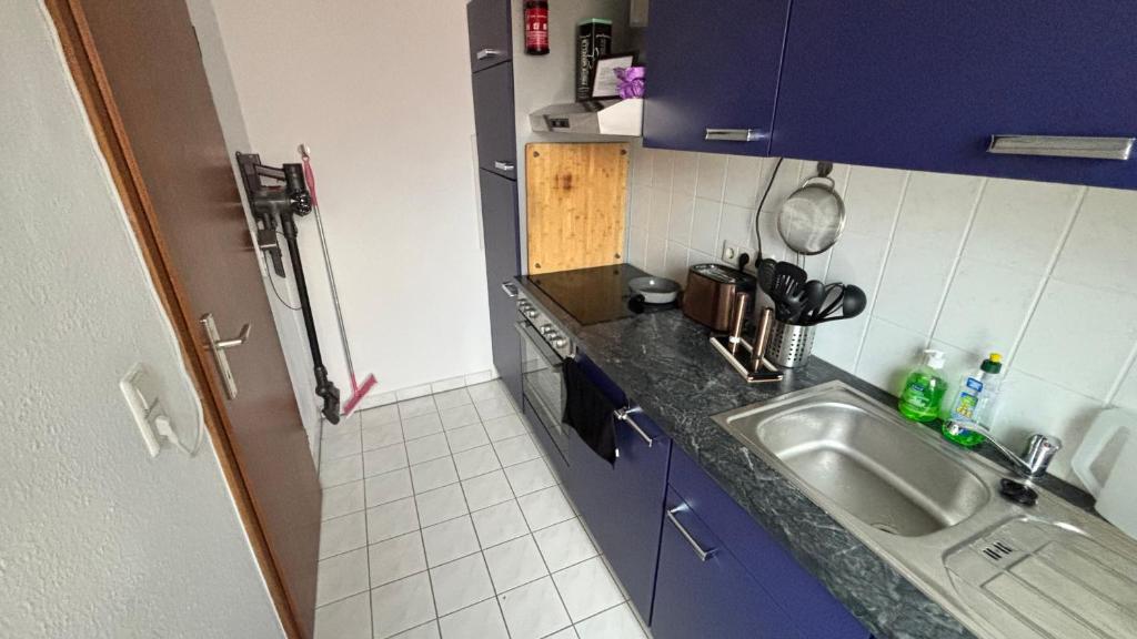 Kuchyň nebo kuchyňský kout v ubytování ModerneDG-Wohnung mit Homeoffice