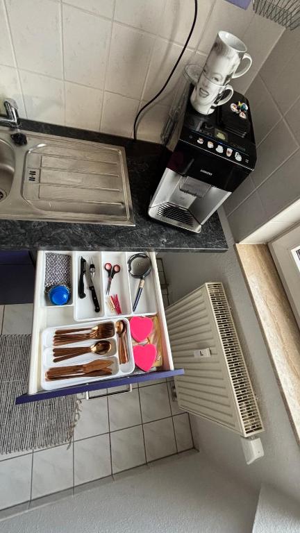 Kuchyň nebo kuchyňský kout v ubytování ModerneDG-Wohnung mit Homeoffice