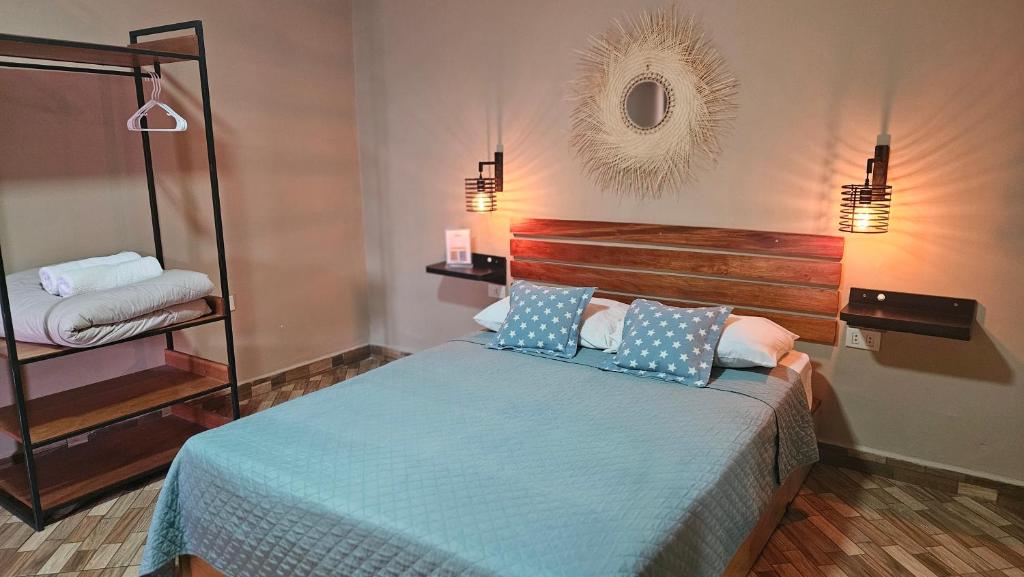 Postel nebo postele na pokoji v ubytování Casa Alamanda - Posada Urbana