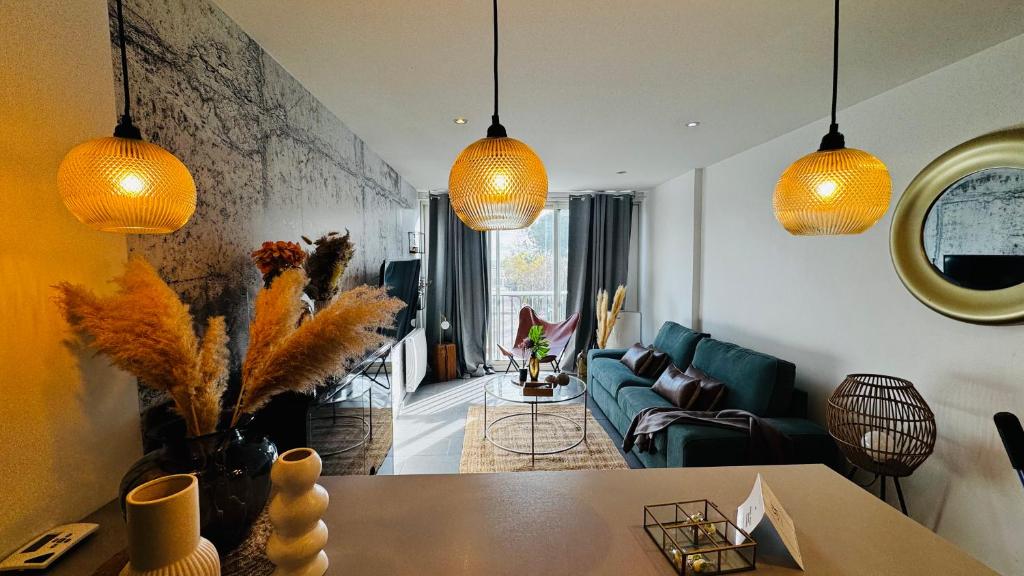 Ruang duduk di Appartement accès direct mer et de toutes commodités