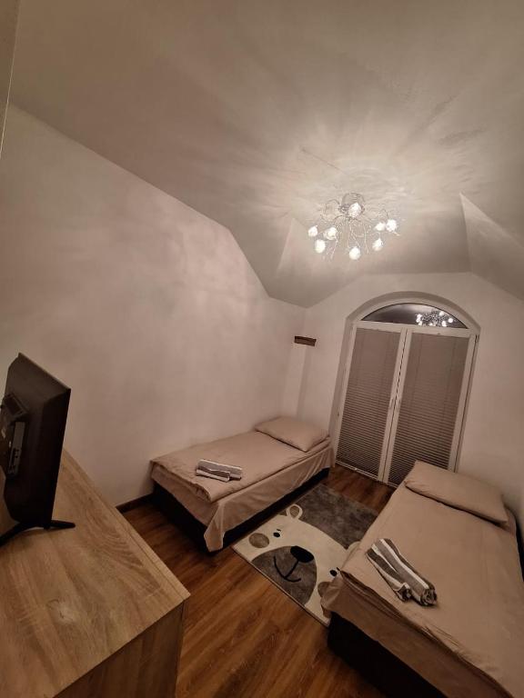 Postel nebo postele na pokoji v ubytování Villa Varzob