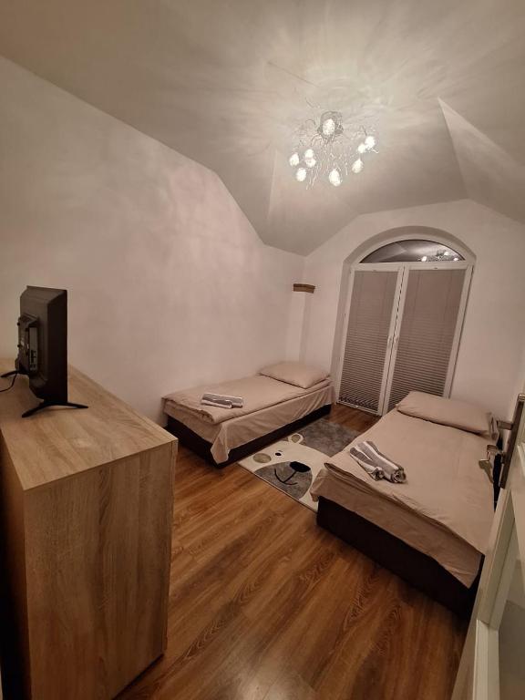 Postel nebo postele na pokoji v ubytování Villa Varzob