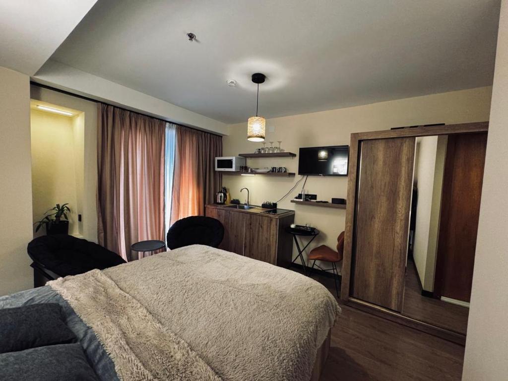 Kuchyň nebo kuchyňský kout v ubytování Room 416