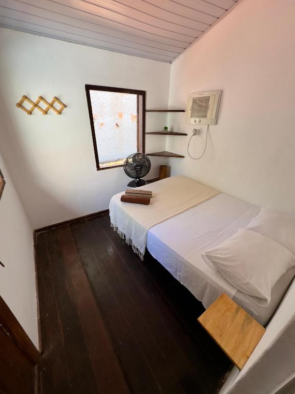 Postel nebo postele na pokoji v ubytování Casa Boa Suites