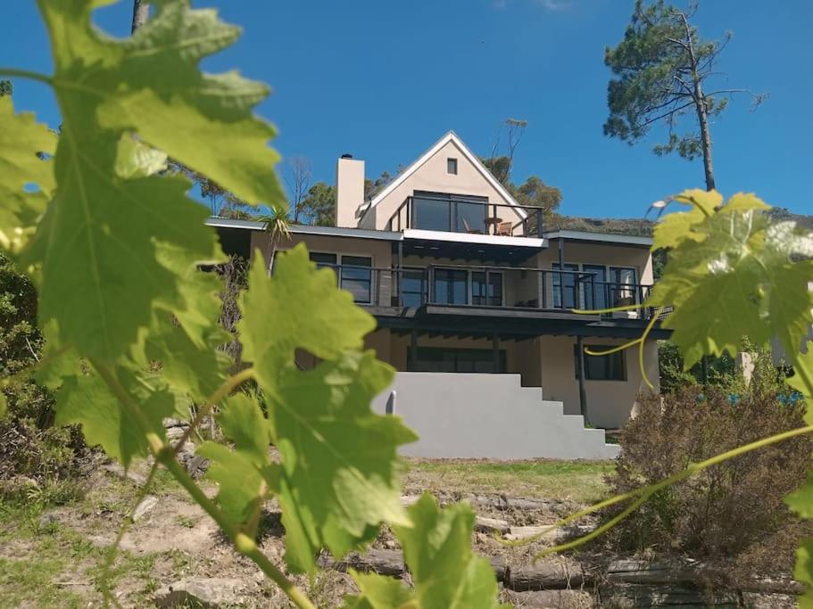 a large house with a porch on top of it at BestPlaceEver - Luxury House with Vineyard Views in Cape Town