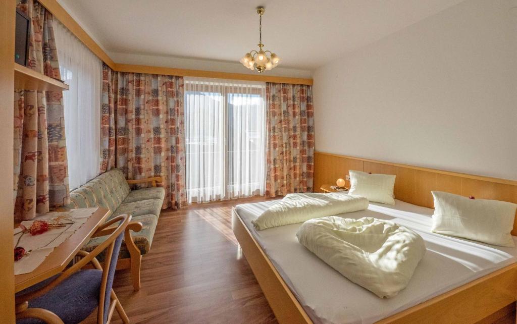 Postel nebo postele na pokoji v ubytování Haus Schluder - Familie Stanitzer