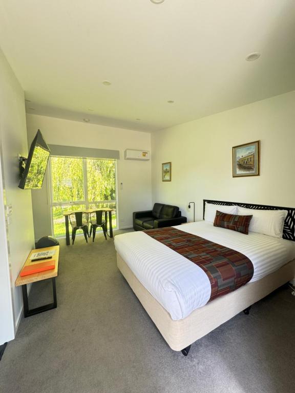 Postel nebo postele na pokoji v ubytování Port Arthur Villas