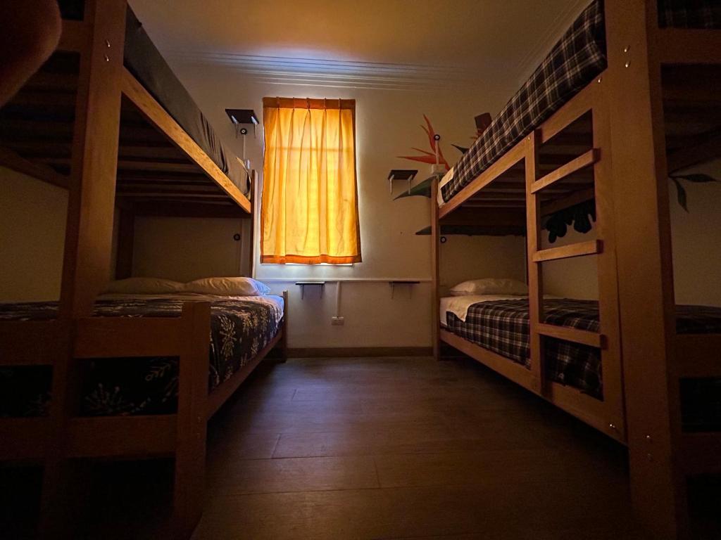 Postel nebo postele na pokoji v ubytování CASA ÁGUILA y CÓNDOR