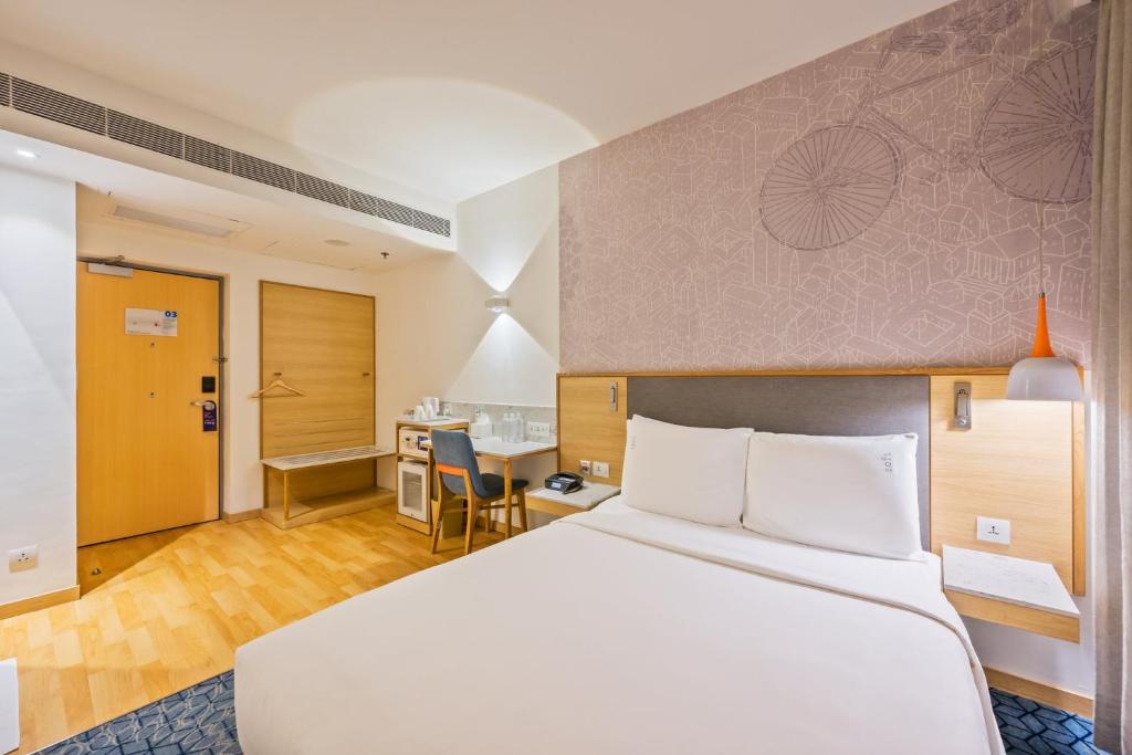 Postel nebo postele na pokoji v ubytování Holiday Inn Express Greater Noida Knowledge Park by IHG