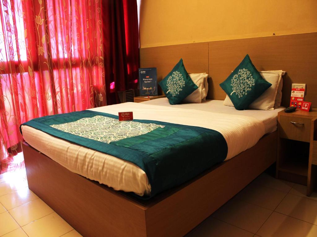 Voodi või voodid majutusasutuse Raj Resort, Bogmalo Beach, Goa toas