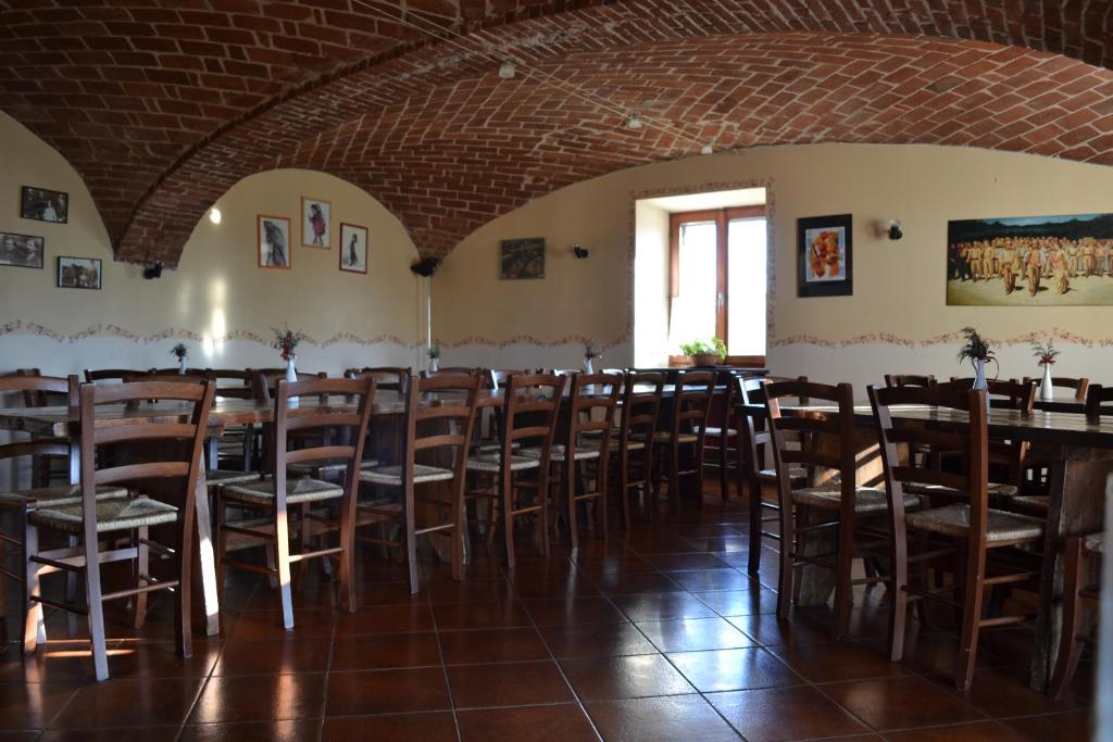 Restoran või mõni muu söögikoht majutusasutuses Cascina Trapella