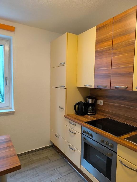 Kuchyňa alebo kuchynka v ubytovaní Apartment Green Home