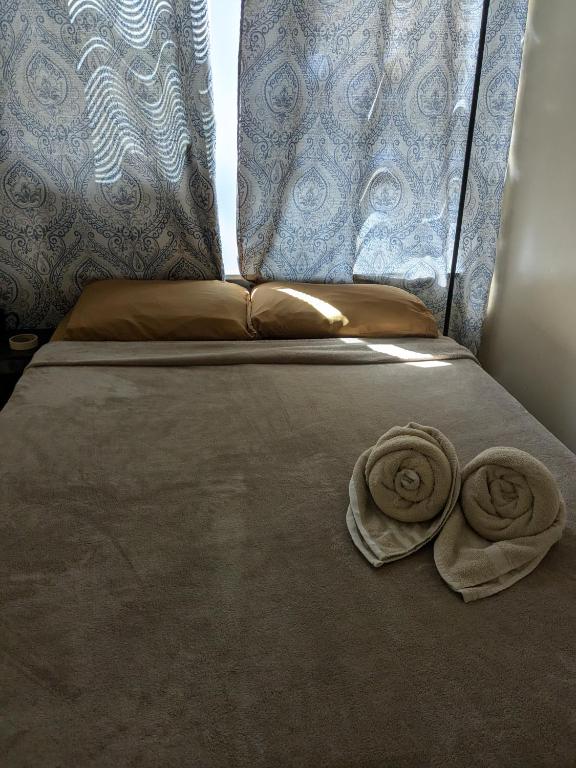 Postel nebo postele na pokoji v ubytování Boston Homestel